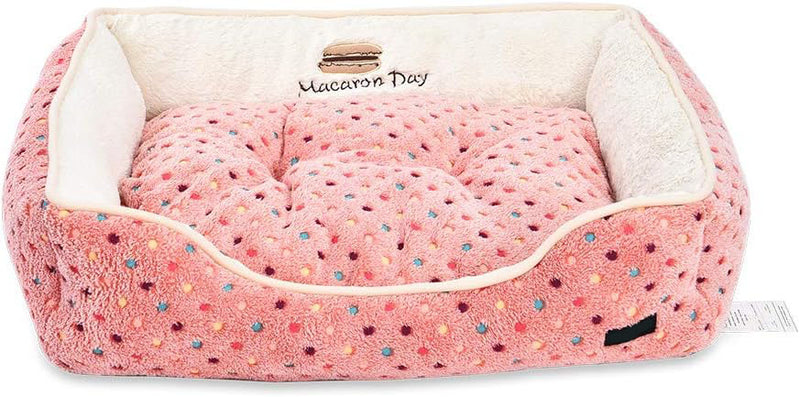 Amazon Basics Cuddler Warm & Cozy Pet Bed for Dogs and Cats (Pink Polka Dots)